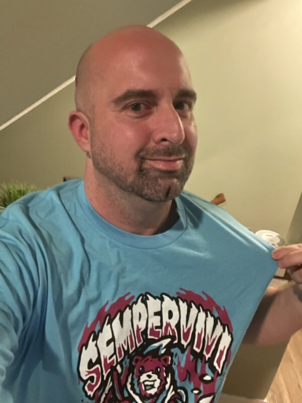 Wrestling Twitter Personality STEVE! wearing our Sempervivi Reaper Bear Shirt